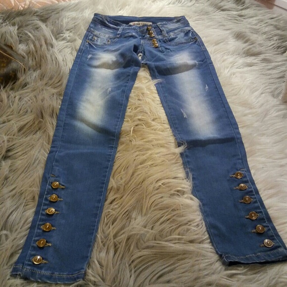 jeans with lots of buttons